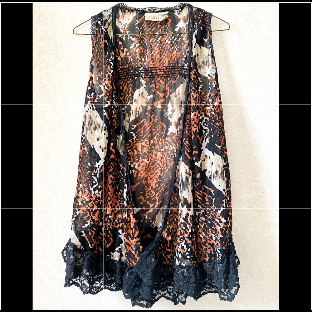 Sleeveless lace detail sheer vest